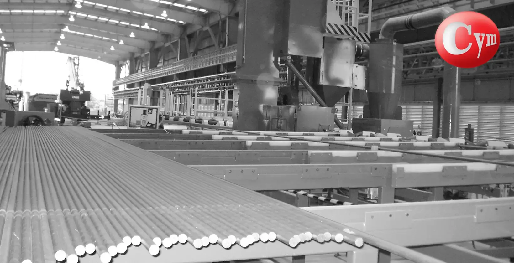 Bancal acumulación varillas de bombeo planta TAMSA México – línea granallado limpieza CYM BAR 1×50HP